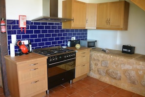 Modern fitted kitchen with range cooker
