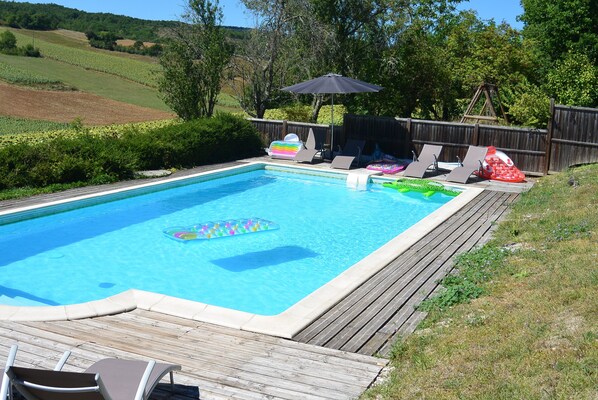 Relax around the fully enclosed pool with stunning views