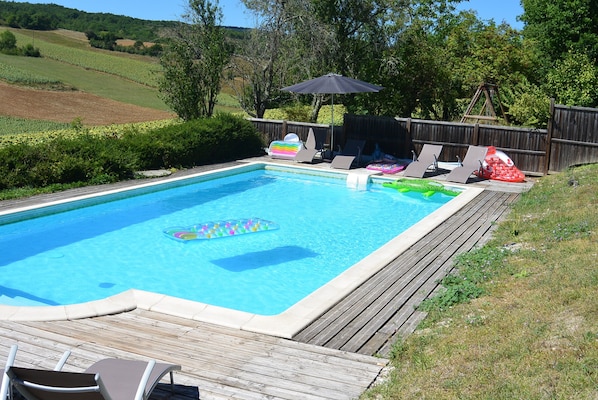 Relax around the fully enclosed pool with stunning views