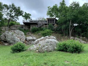 The house sits atop a huge cliff providing spectacular views and cross breezes! 