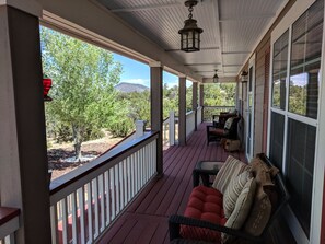 No shortage of seating on the beautiful wrap around porch.  Such peace.