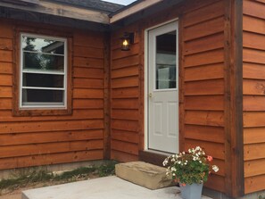 The 10x10 porch is great. Winter guests love to stash helmets, suits, and skis.