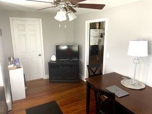 Dining room with dining table and tv