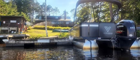 Pontoon and docks in sight of the Lodge. Rent the pontoon. Bait for sale too.