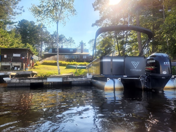 Pontoon and docks in sight of the Lodge. Rent the pontoon. Bait for sale too.