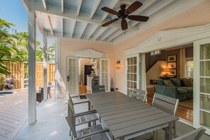 Kitchen and large living room have direct access to outside dining table.