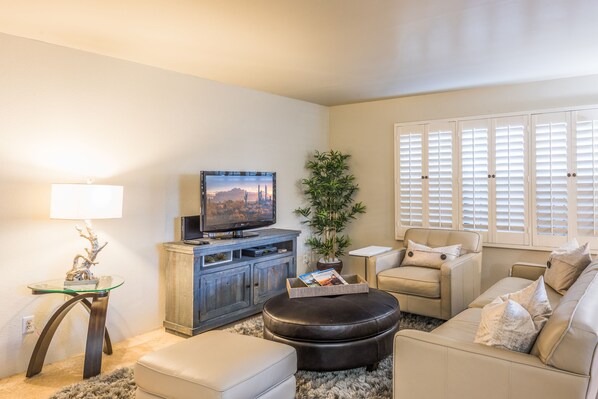 Comfortable Living Room with Cable TV and Apple TV