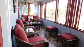Relax on the screened 2nd story porch.
