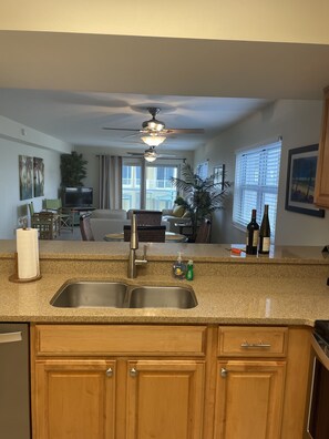 Kitchen has everything needed to prep and serve meals