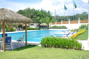 Ground Level Pool, Social Area, and Cabanas