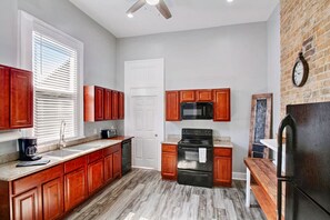 Full kitchen - door to bedroom 2