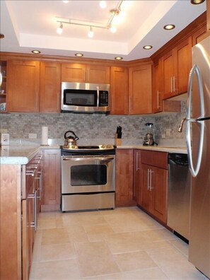 Renovated - granite countertops & stainless steel appliances