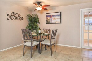 Dining area seats four people - breakfast bar seats 2 - high top table seats 4
