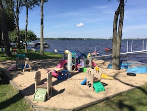 Huge 40'x40' sandbox full of toys for the kids.