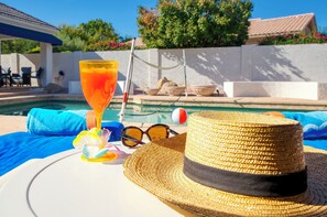 Relax and soak up the sun poolside with a "complimentary" beverage 