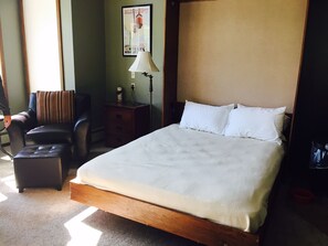Comfy queen sized murphy bed on first floor