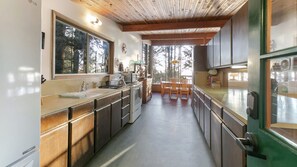 Front door and kitchen.