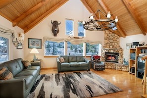 Spacious living room with mountain views.