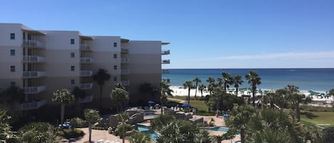 Unit B410 has excellent views of BOTH the Gulf and courtyard pool