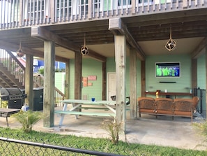 Nice Outdoor Area- great for grilling with picnic table and seating area with TV