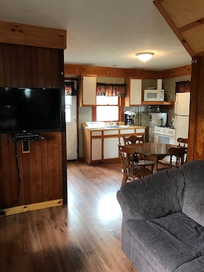 Living Area with TV into Kitchen