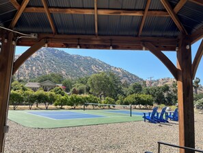 View from riverfront Pickleball Court toward the Bridge House. Incredible!!