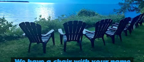 Adirondack chairs await you visit. 