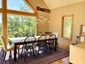 Dining table with space for 10 (2 more seats at kitchen island)