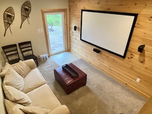 Theater has direct access to the patio and hot tub area