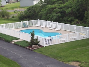 On site pool, steps away from condo door