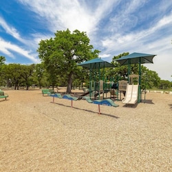 Community playground located in the 50 acre park that is a peninsula with endless beaches, sandbars and the deepest water boat ramp in lake Travis.