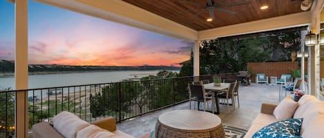 Lakefront house has incredible outdoor living areas with sunset and sunrise views of Lake of Travis.