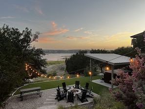 Lake House paradise with heated swim spa plunge pool, fire pit and turf grass