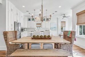dining and amazing kitchen with cozy seating, gas range and upscale appliances