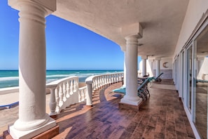 The upper terrace has stairs that lead down to the shower & lower terrace level.