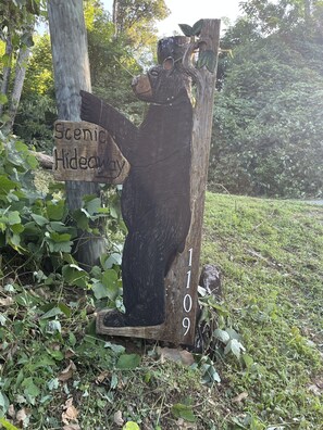 The bear will point you up to the cabin. You have arrived. Enjoy your vacation!