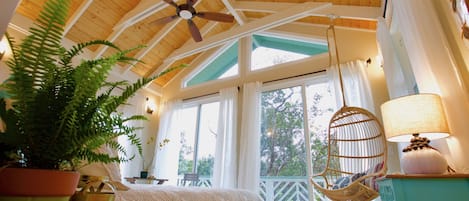 Floor to ceiling windows showcase the beautiful native flora. 
