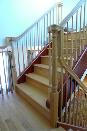 Large loft bedroom is located on second floor.