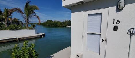 Your bungalow is a sidewalk's width from the Venice Inlet