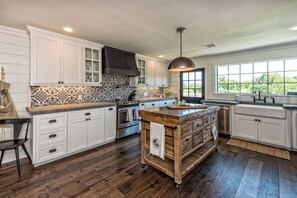 Fully appointed kitchen, with everything necessary for feast preparations 