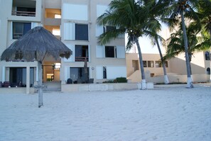 oceanside view of white sugar sand private beach(pool on right)