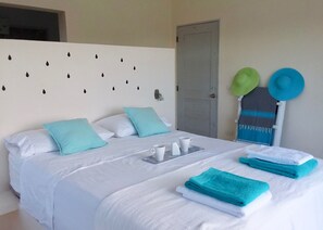 Ensuite bedrooms overlooking the ocean, with a very confy queen-size bed.