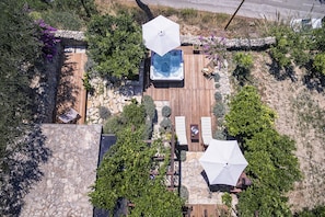 Air footage of the lower garden that surrounds the apartment.