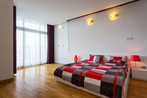 master bedroom with balcony