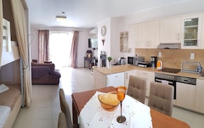 A very bright and spacious living room with comfortable sofas to relax.