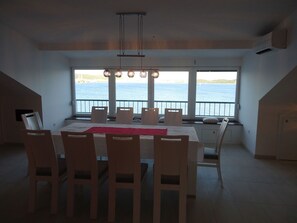 VIEW from dining room on the top floor,sea is ZERO metres from the house