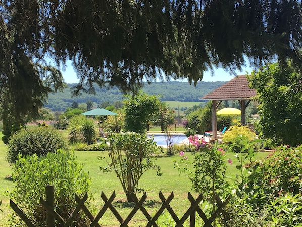 View from the house of the pool and pool house