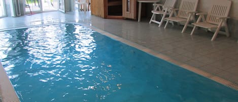 Inside heated and filtrated Pool includes contraflow and massage