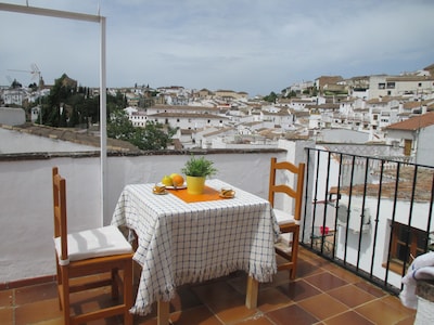 Stay Poolside in a Ronda  Town House with private roof terrace and lovely views.