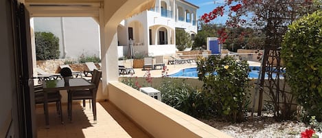 Private balcony with views over the pool.